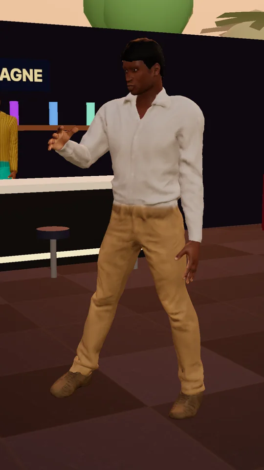 A Sim with a drink on a Lagos rooftop at sunset